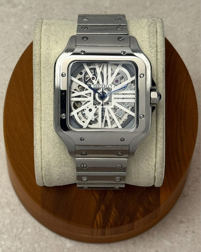 PB TimePiece Aviator Skeleton watch with a 38mm stainless steel case, bracelet, and striking blue hands.